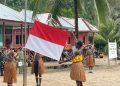 Antusiasme Tinggi Warnai Upacara Hardiknas di SD Naena Kekwa Bersama Satgas TMMD Kodim 1710/Mimika